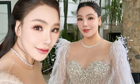 Cô dâu U50 Hồ Quỳnh Hương diện hai chiếc váy cưới lộng lẫy, e ấp xuất hiện bên chú rể