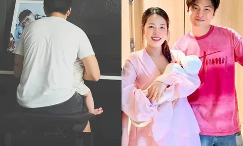 Puka khoe cảnh chồng bế ru con sau nửa năm sinh bé đầu lòng, nhóc tì nay bụ bẫm, đầu đầy tóc